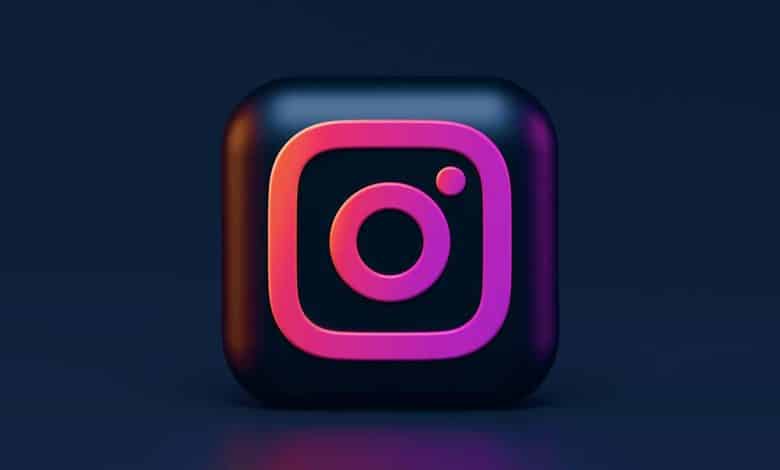 3d rendering of the instagram logo icon with a glossy finish, featuring a pink and purple gradient outline and a dark background. the icon includes the classic camera and dot design.