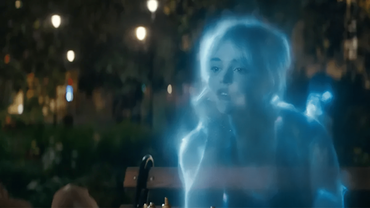 A translucent, ghostly figure of a young woman appears in a nighttime park setting, illuminated by soft, glowing star lights in the background that create a mystical atmosphere.