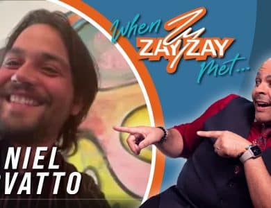 Split-screen image with Daniel Zovatto smiling on the left, and a man on the right pointing at the text "Exclusive Interview with Daniel Zovatto" above his own image. Both are in