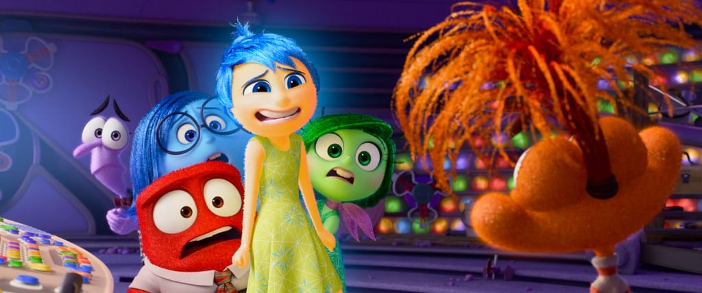 Animated characters from the movie "Inside Out 2" expressing various emotions. Joy is smiling brightly in the center, while Sadness, Anger, and Disgust show contrasting expressions. Colorful