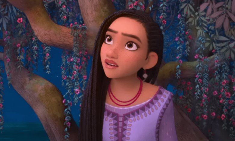 An animated young girl with long, dark hair and large eyes looks anxiously to her right. She stands near a tree adorned with vibrant pink flowers, with a dimly lit blue background suggesting evening or