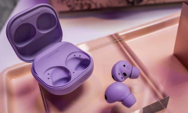 Title: What We've Learned So Far: An Overview

Description: Open lilac-colored wireless earbuds case with one earbud beside it, set on a reflective blush surface. A soft atmospheric