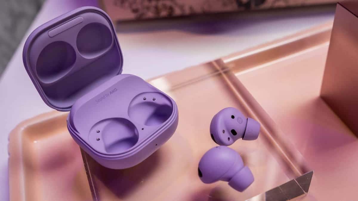 Title: What We've Learned So Far: An Overview

Description: Open lilac-colored wireless earbuds case with one earbud beside it, set on a reflective blush surface. A soft atmospheric