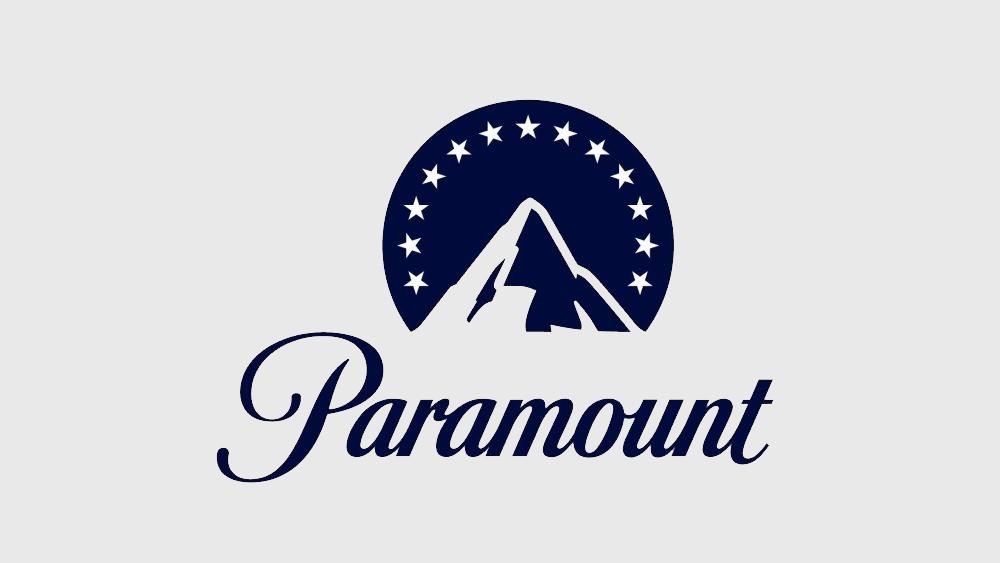 Logo of paramount featuring a stylized mountain peak inside a circle adorned with stars, in dark blue on a light gray background, with the word "paramount" in a curved, elegant script below.