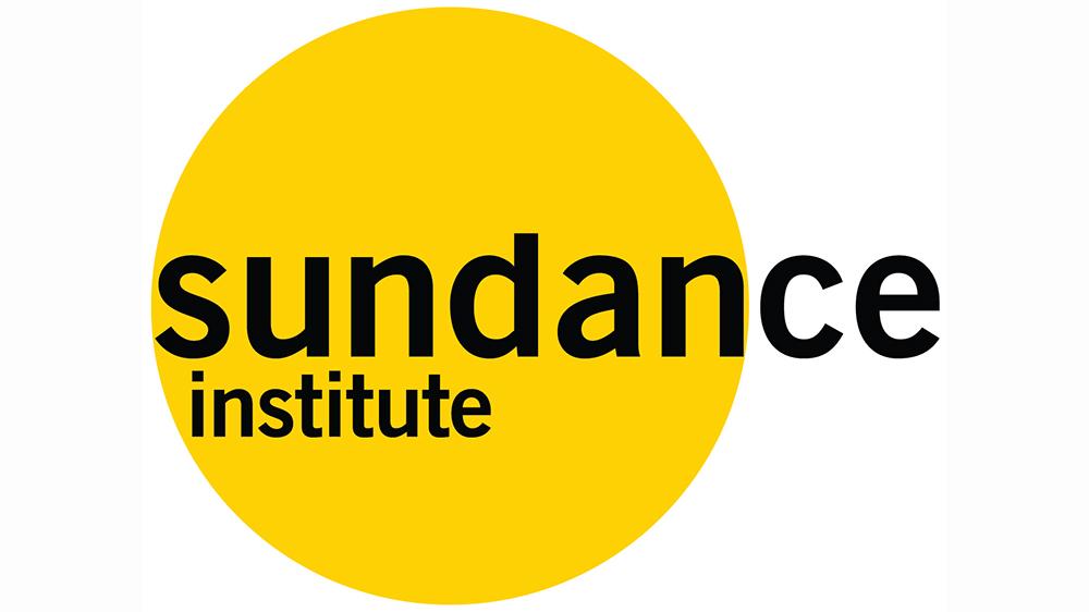 Logo of the sundance institute featuring the word "sundance" in black lowercase letters on a yellow circle, with "institute" in smaller lowercase letters underneath.